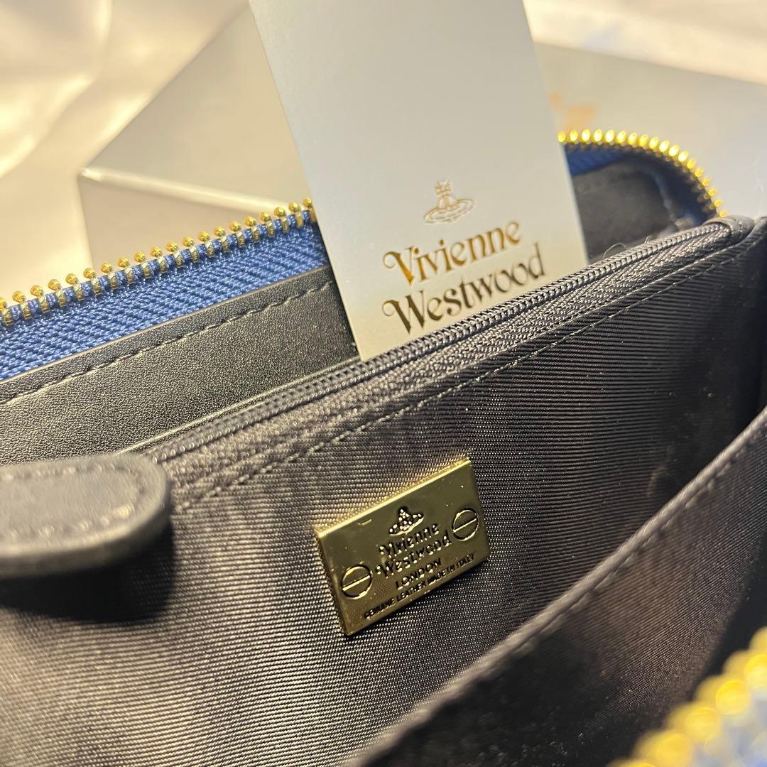 し*ん様 新品 Vivienne Westwood レッド青ライン 長財布 バレ