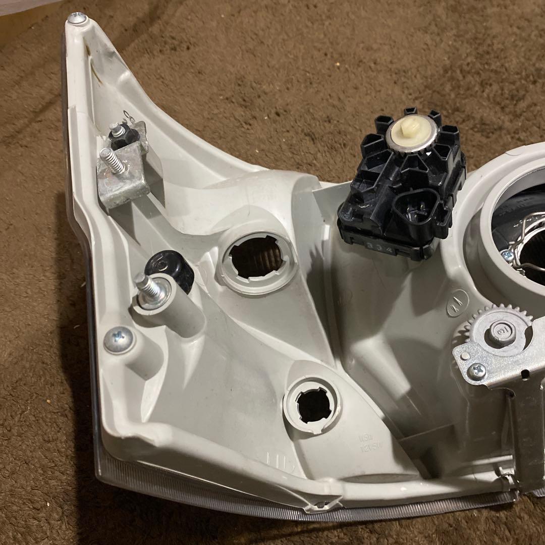 ハイゼットトラック　EBD-S211Pヘッドライト左