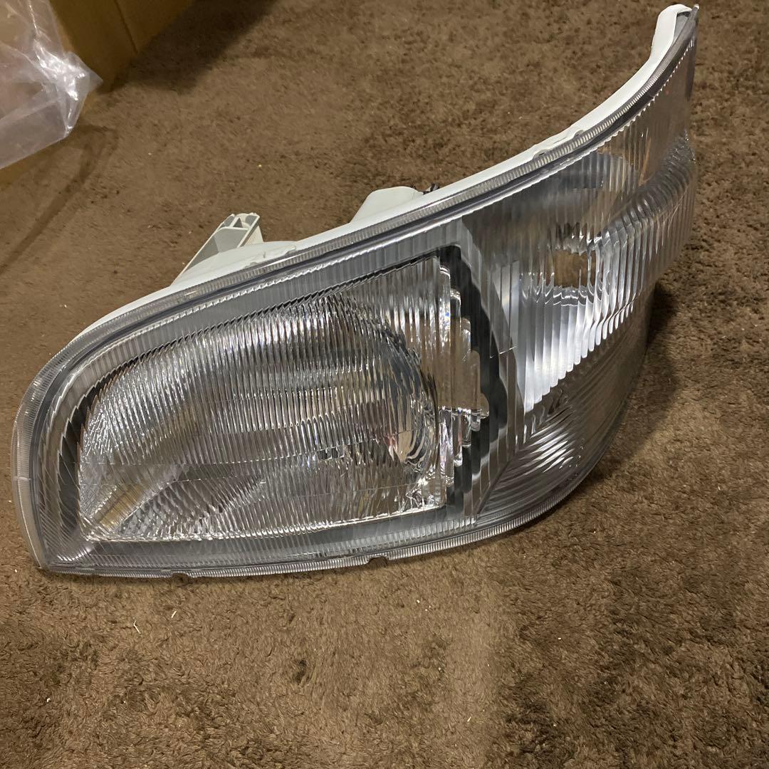 ハイゼットトラック　EBD-S211Pヘッドライト左