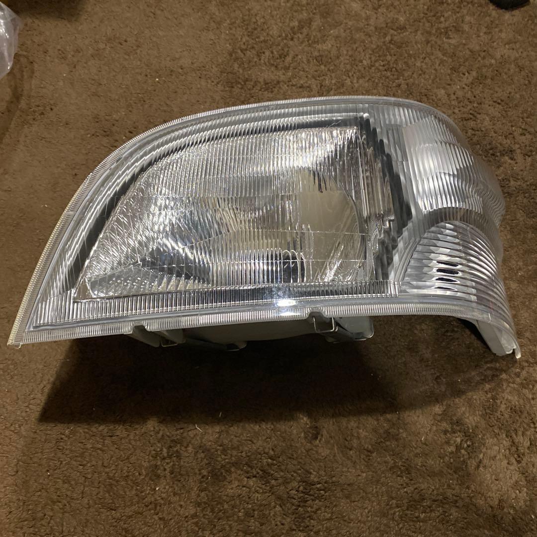 ハイゼットトラック　EBD-S211Pヘッドライト左