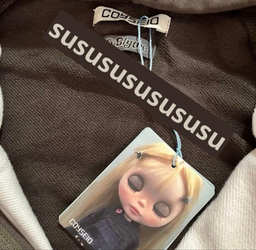 トップス COYSEIO X BLYTHE GRAPHIC ZIP-UP HOODIE