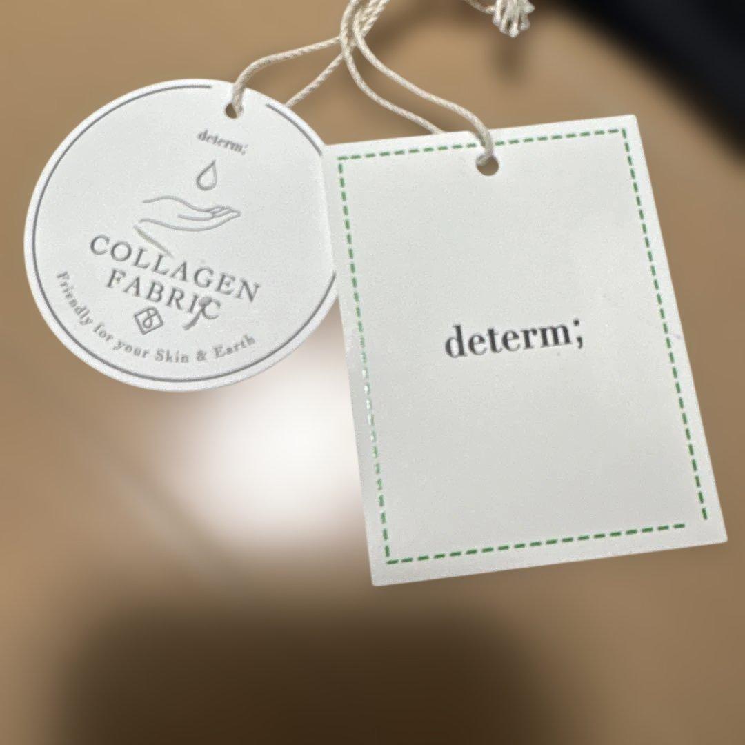 ＜determ＞PIPING OPEN BACK TOP/トップス