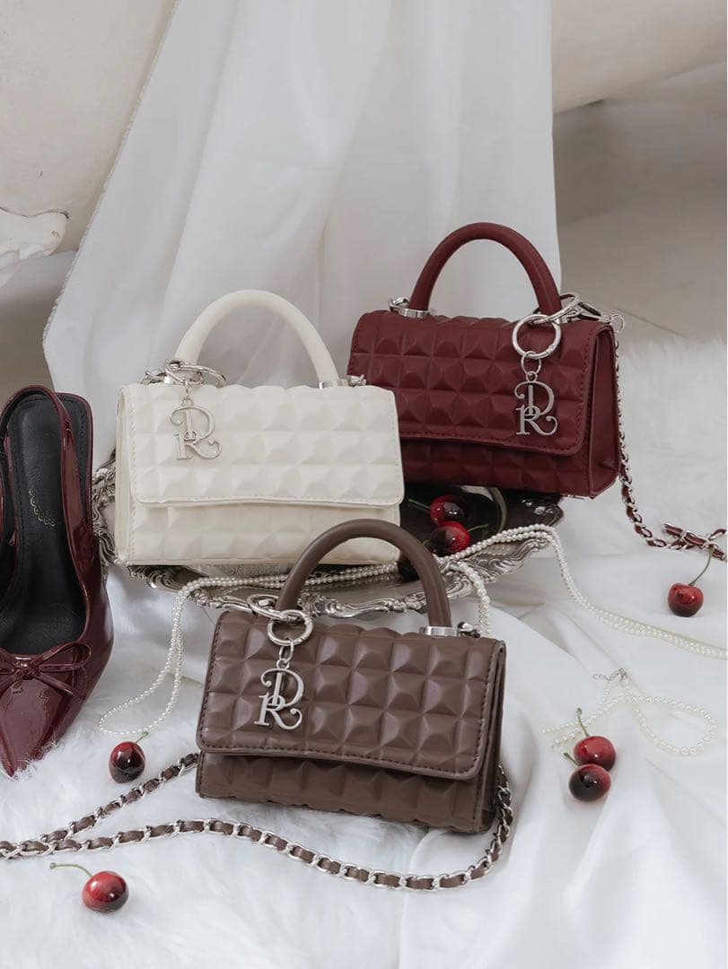 darich ダーリッチ DRチャームチョコレートハンドバッグ アイボリー