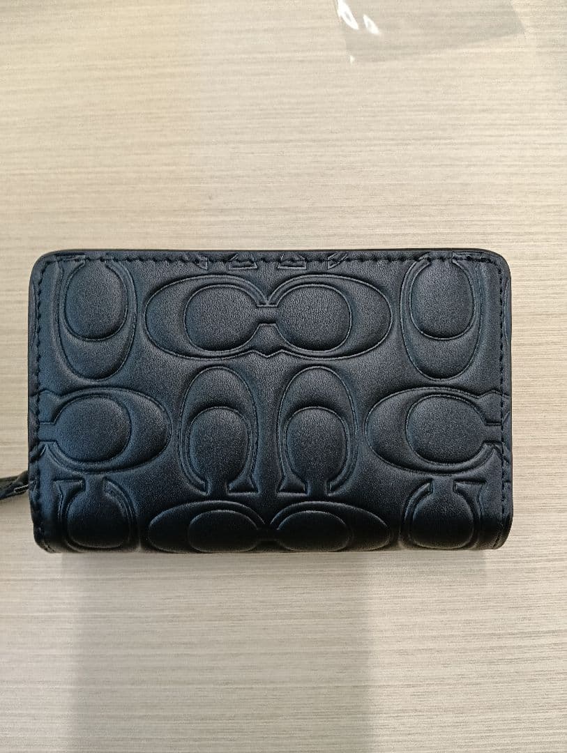 COACH エンボス加工 ブラック 2つ折り財布　美品