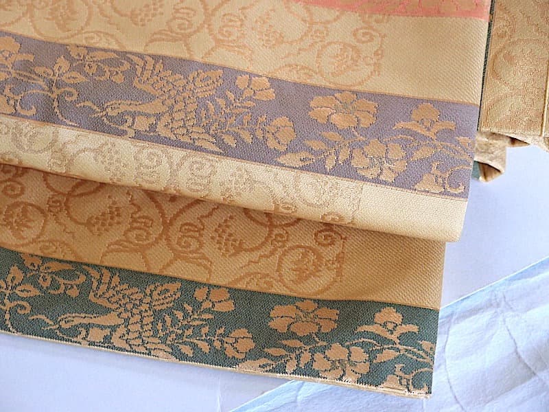 織りの九寸名古屋帯（横段に唐花文）長373 正絹美品