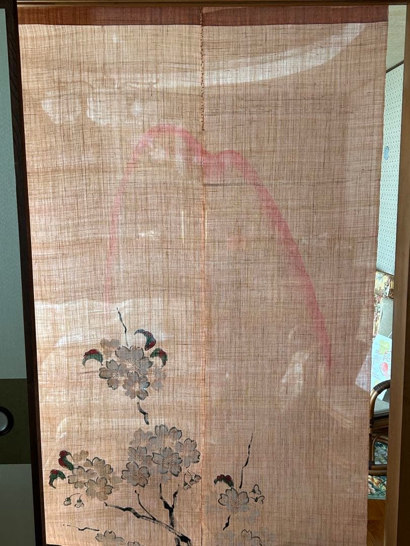 桜の花模様の薄いピンクのれん