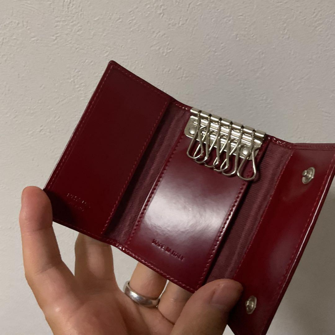 向日葵 新品未使用 美品 プラダ ロゴエンボス レザー キーケース