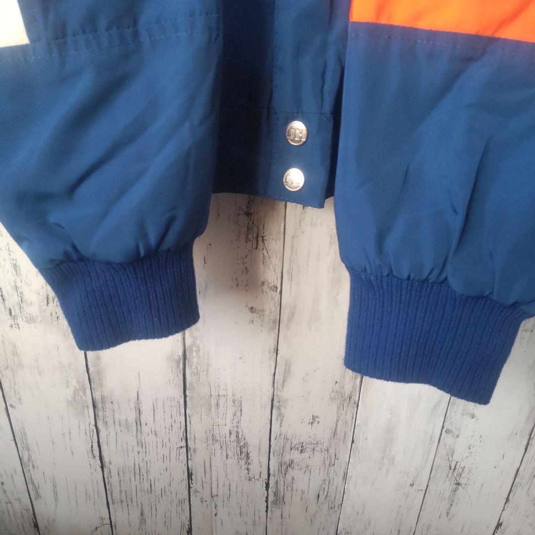 MLB メッツの刺繍ビッグロゴが映えるリバーシブル仕様の合皮スタジャン古着 XL