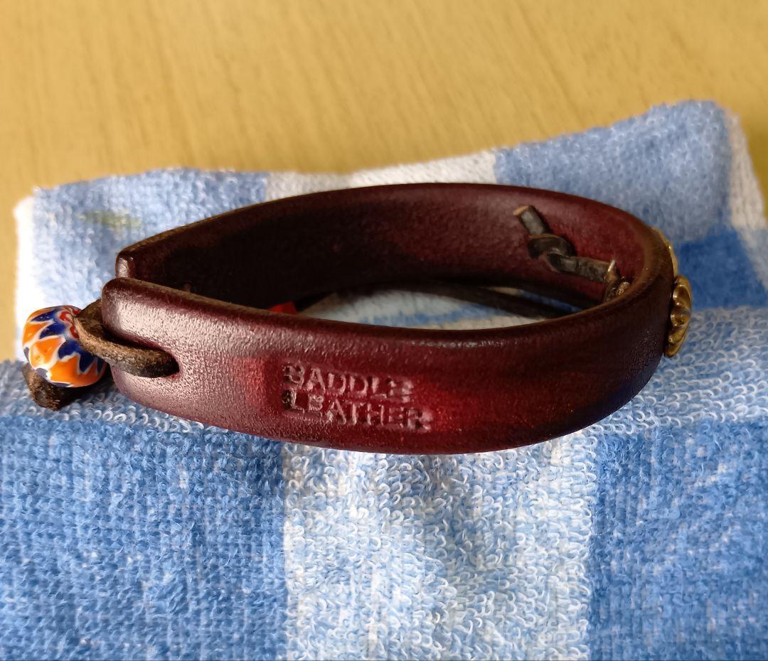 吾郎作・サドルレザーバングル（鐘打ちコンチョ付き)一点物。
