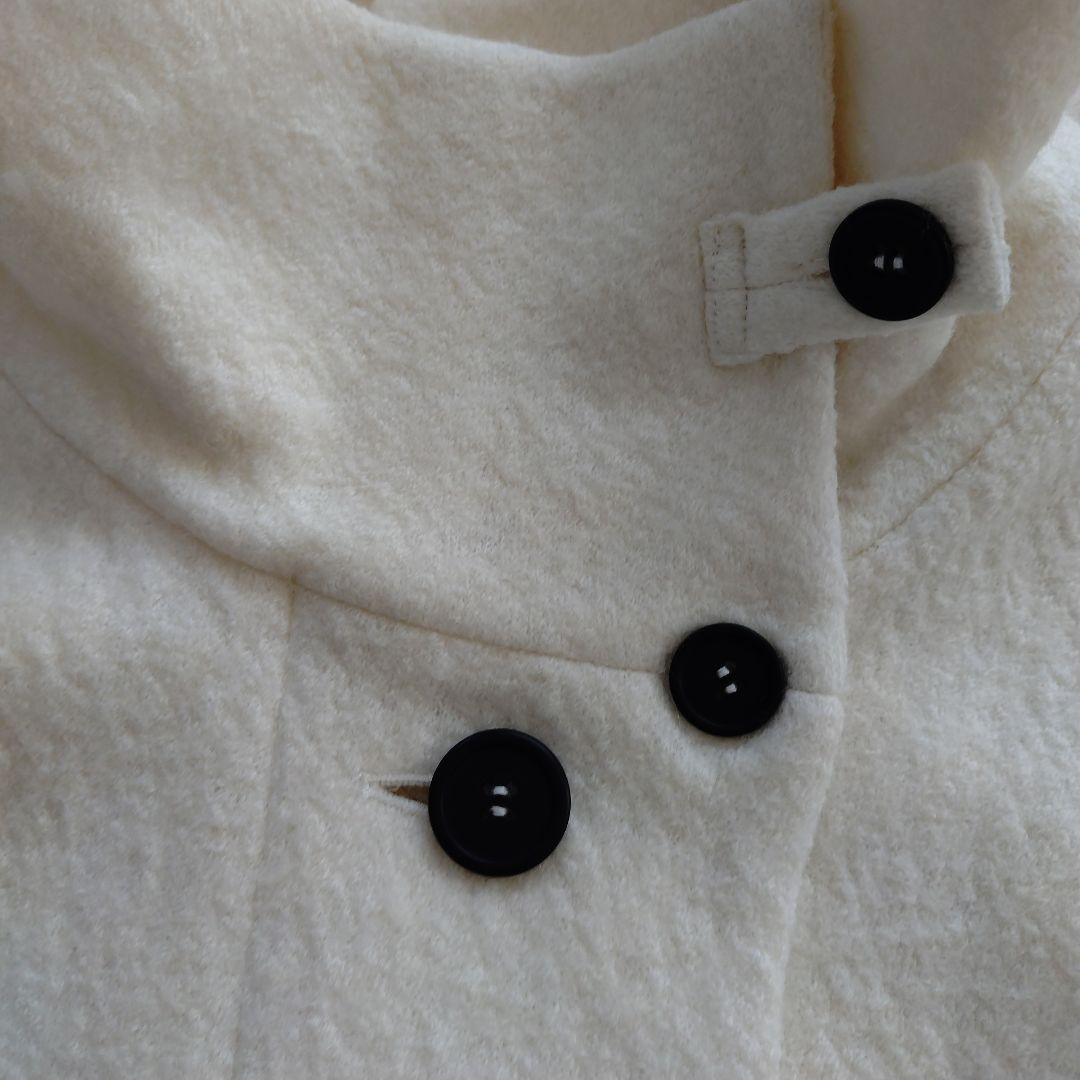 センソユニコ　モユル ホワイト ボタン付き ハイネック ポンチョ