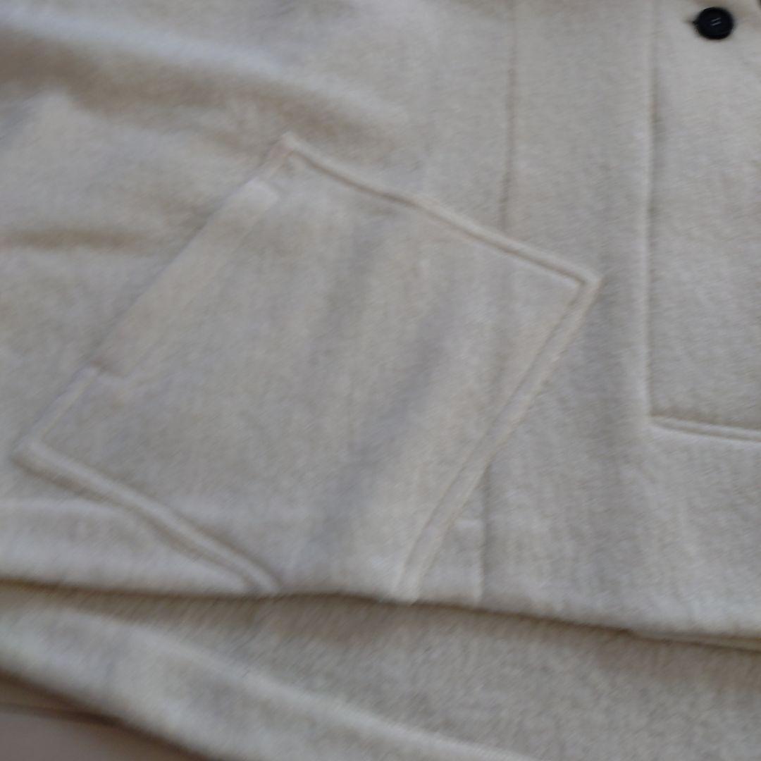 センソユニコ　モユル ホワイト ボタン付き ハイネック ポンチョ