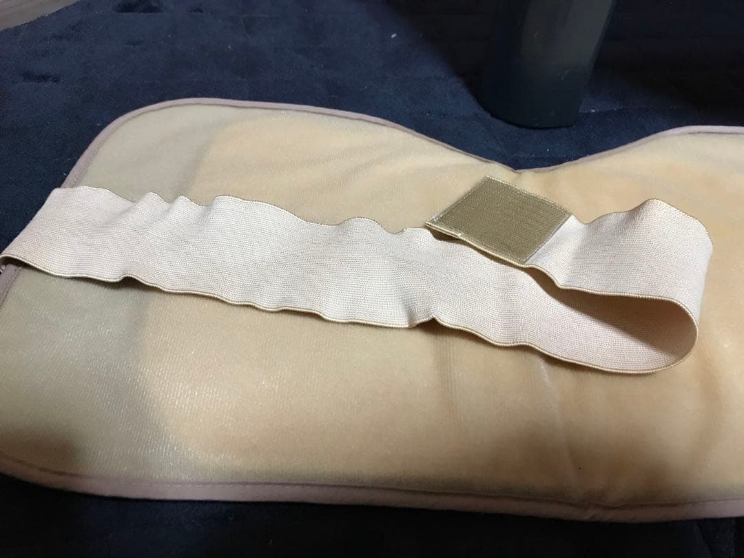 遠赤外線温熱ベルト　パーマクリストとヒマシ油冊子(本体のビニール部にシミあり)