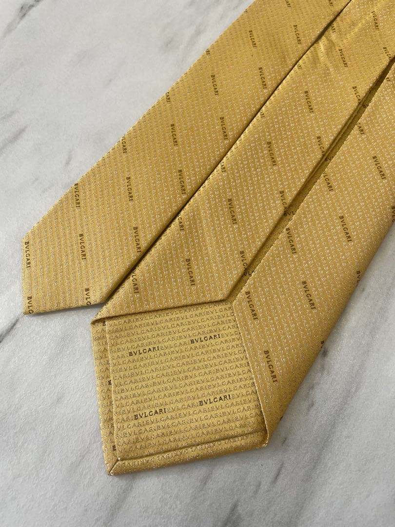 【新品箱タグ付】ブルガリ BVLGARI ロゴ総柄 ゴールド系 ネクタイ 黄色系