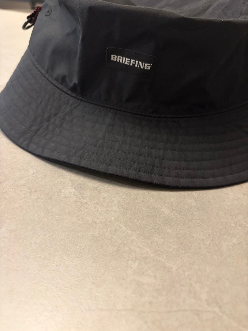 COMME des GARCONS HOMME x BRIEFING バケット