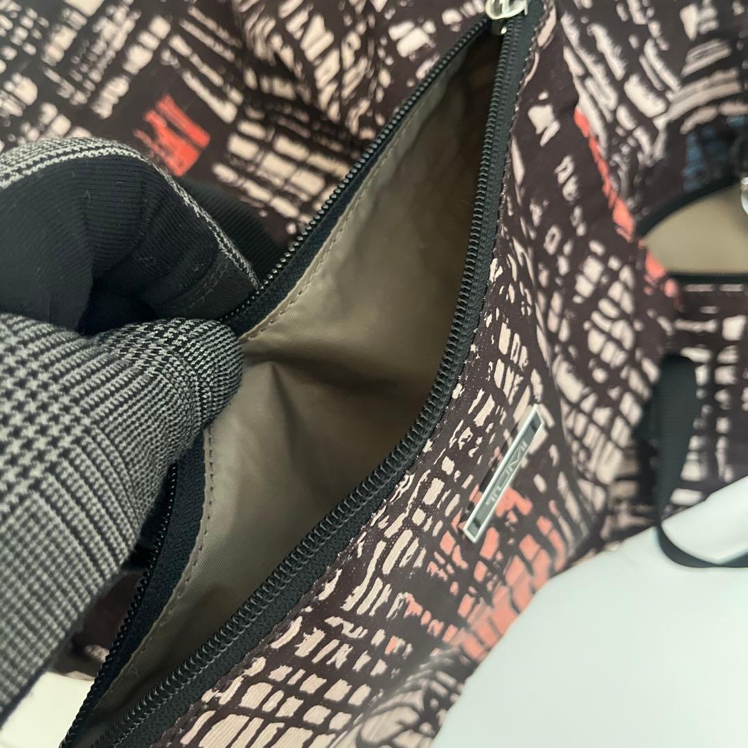 used・TUMI折畳みボストンバッグ・背にループ付き
