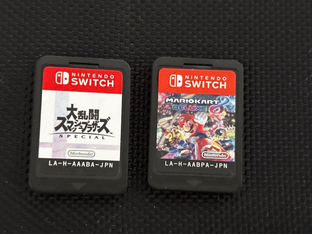 Nintendo Switch 本体　 カセット2つ・Joy-Con4本付き