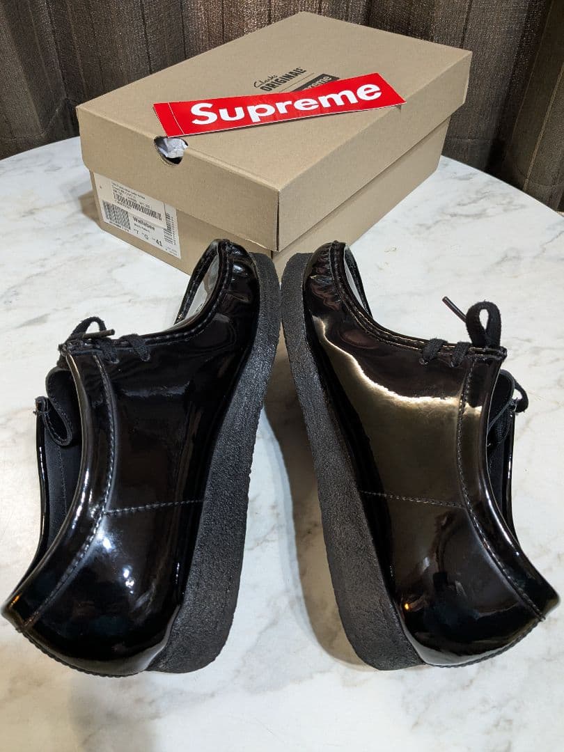 Supreme × Clarks patent leather wallabee