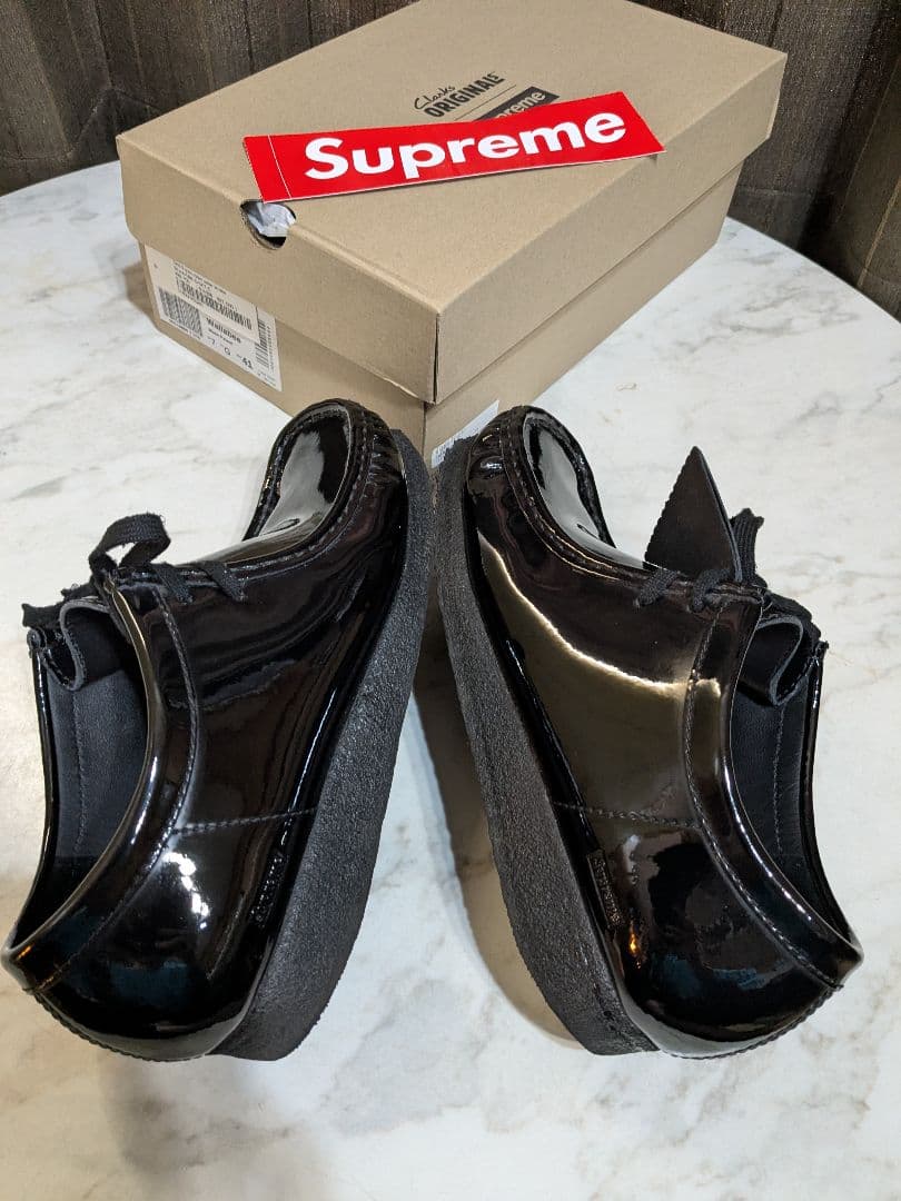 Supreme × Clarks patent leather wallabee