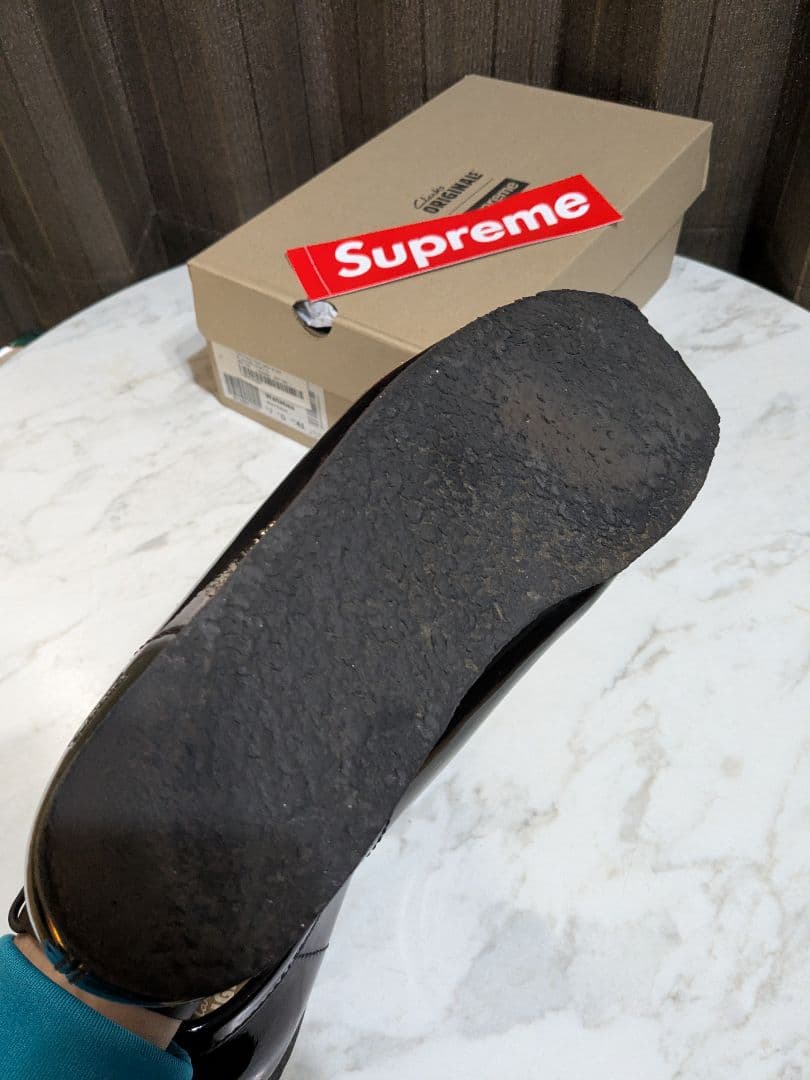 Supreme × Clarks patent leather wallabee