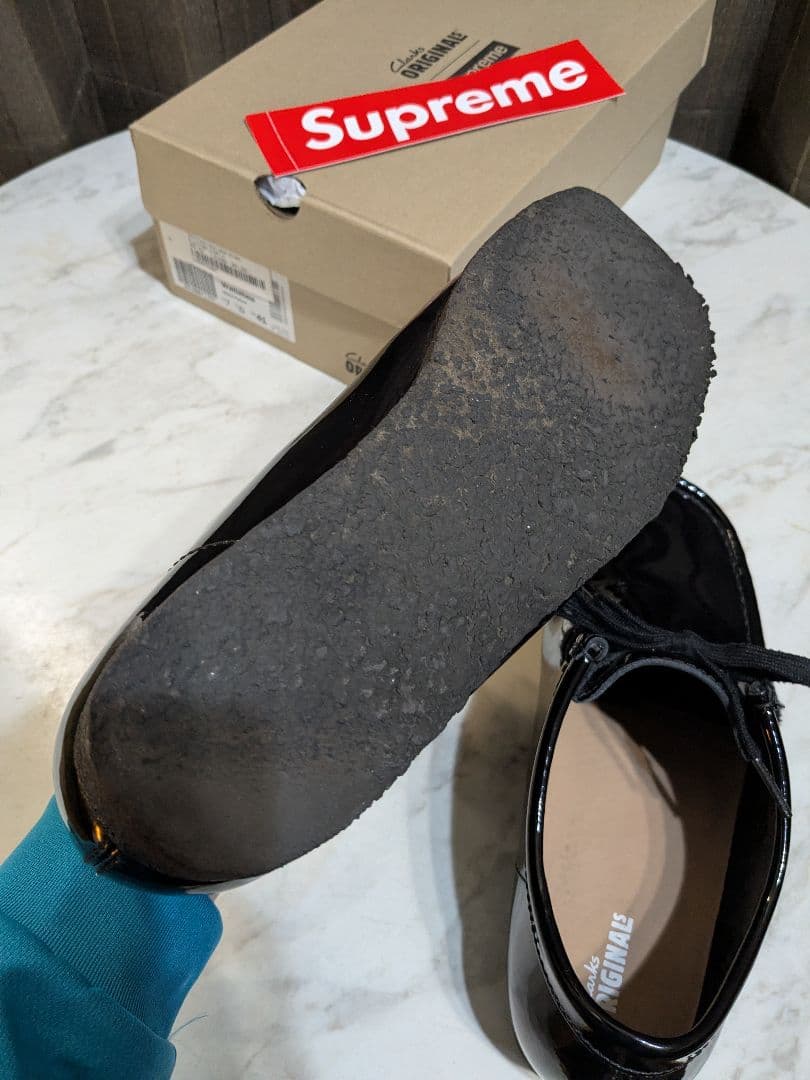 Supreme × Clarks patent leather wallabee