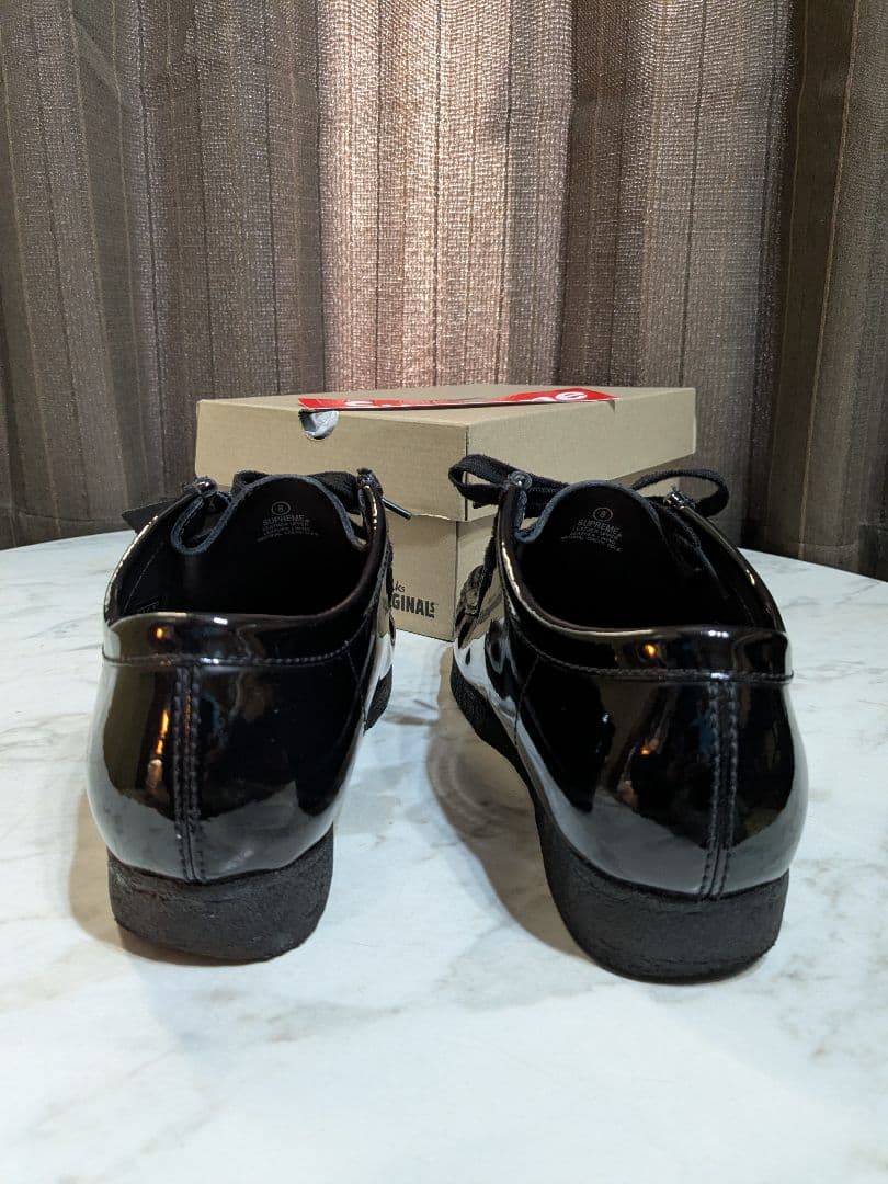 Supreme × Clarks patent leather wallabee