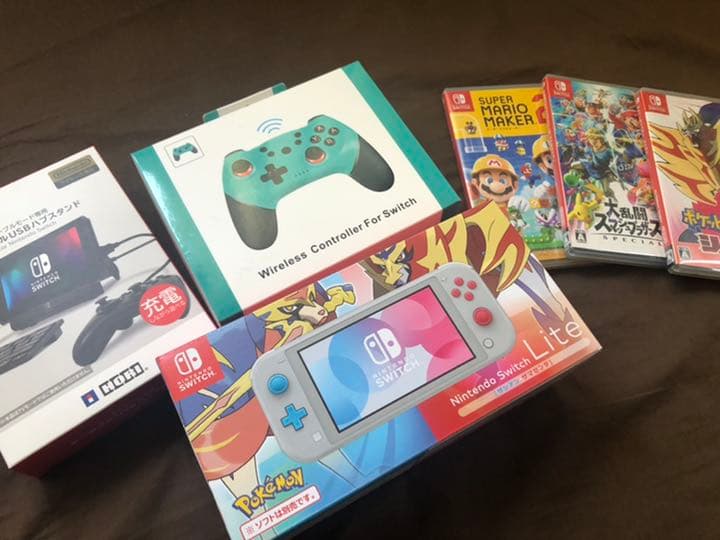 スイッチライト・ゲームソフト3本・コントローラー・スタンド