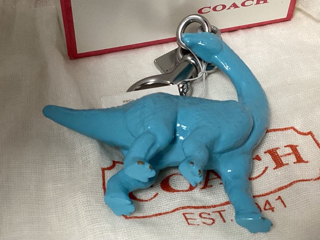 未使用タグ付きコーチCOACH ダイナソー恐竜型キーホルダー 青本物