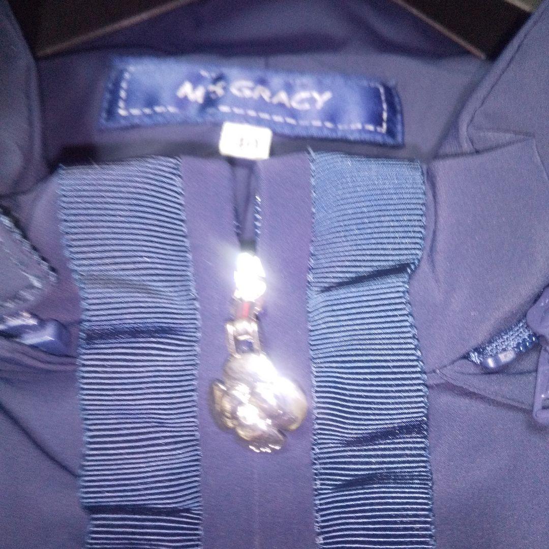 エムズグレイシー 可愛いフリルつきダウンベスト フードつき