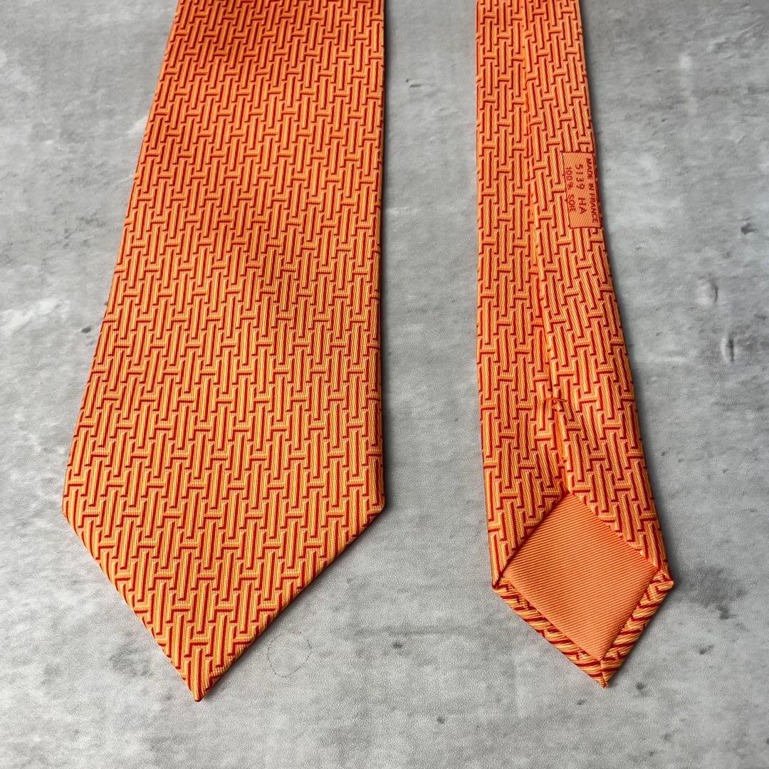 美品 HERMES エルメス H柄 総ロゴ ネクタイ オレンジ