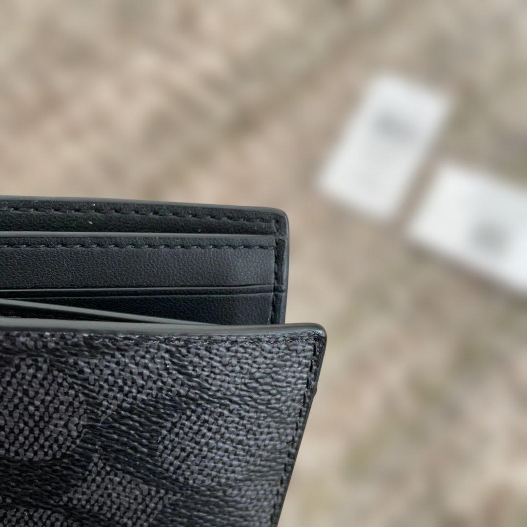 新品未使用　49,500円　COACH 二つ折り財布