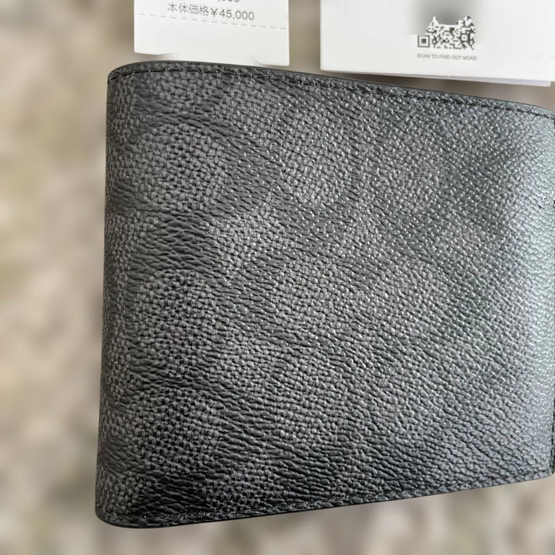 新品未使用　49,500円　COACH 二つ折り財布