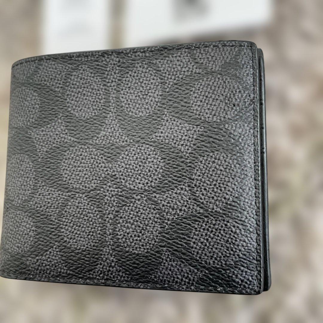 新品未使用　49,500円　COACH 二つ折り財布