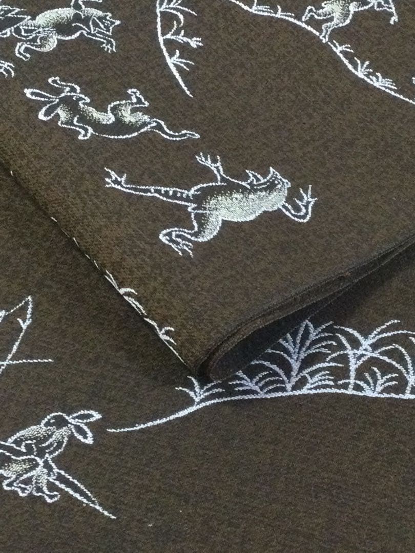 素敵な装い！西陣名古屋帯 綿芯仕立付 「鳥獣人物戯画」茶　簡易包装