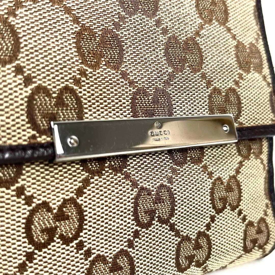 グッチ　折り財布　ロゴプレート　GGキャンバス　スクエア　コンパクト　レザー　美