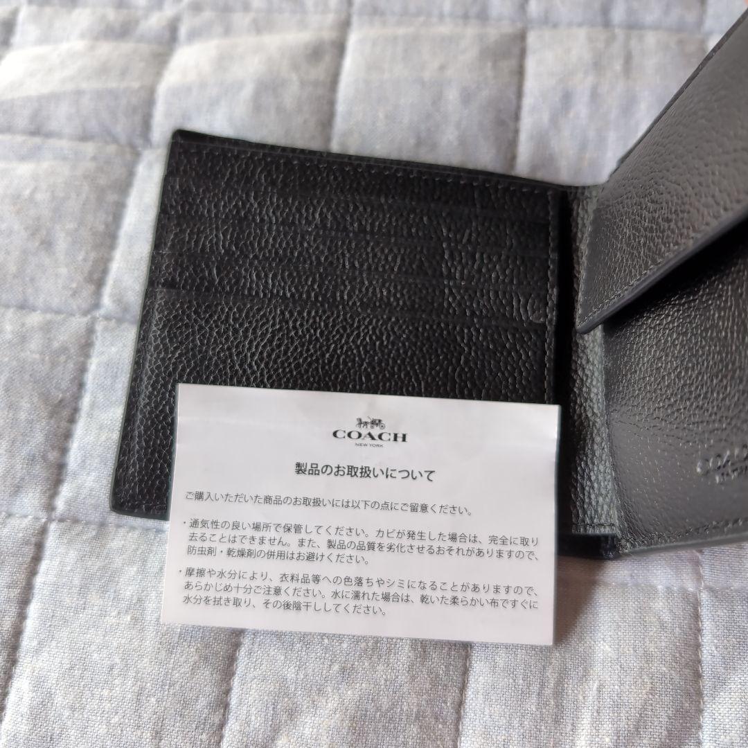 COACHコーチシグネチャーシンプルブラック二つ折り財布【新品未使用】　傷あり