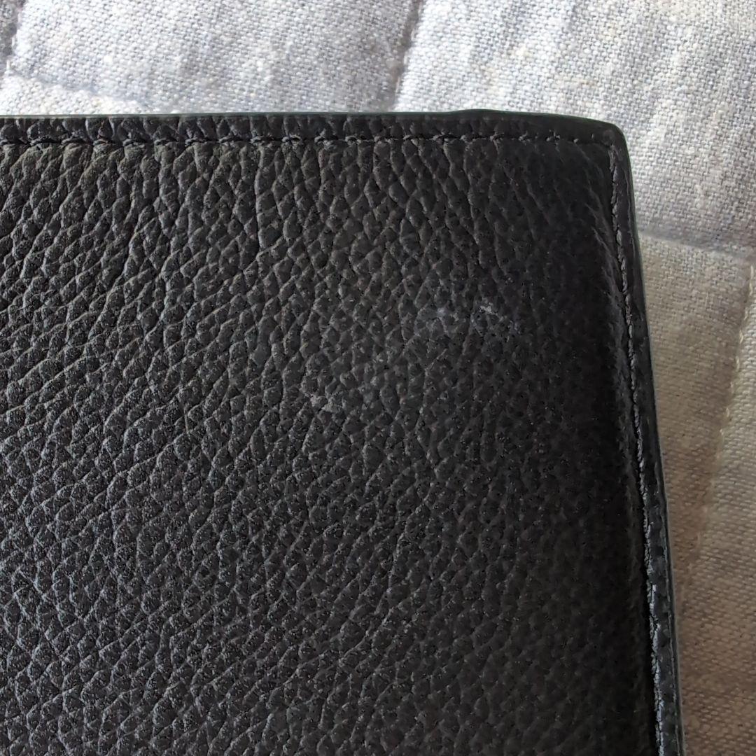 COACHコーチシグネチャーシンプルブラック二つ折り財布【新品未使用】　傷あり