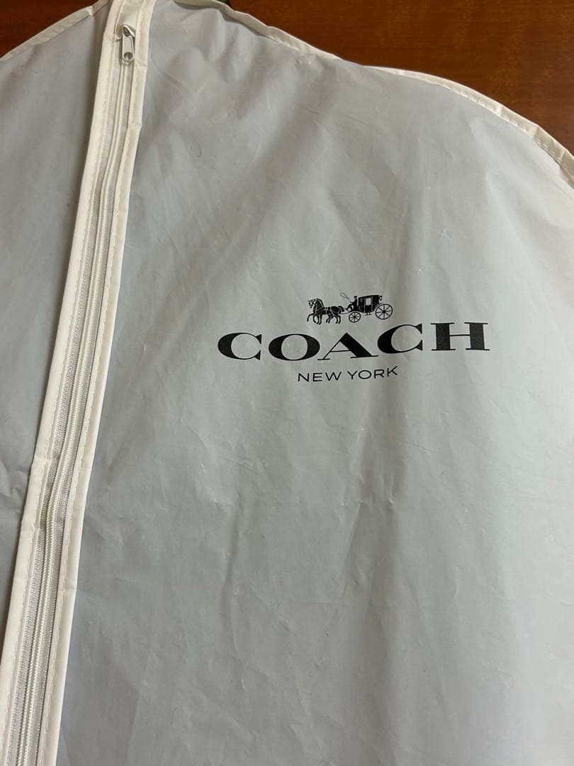 コーチ COACHケープコート ブラック 裏総柄　衣装カバー付　タグ付き　新品