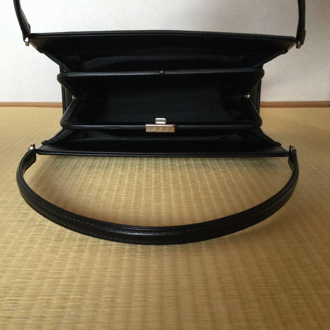 Guchimim　黒のハンドバッグ 箱付き