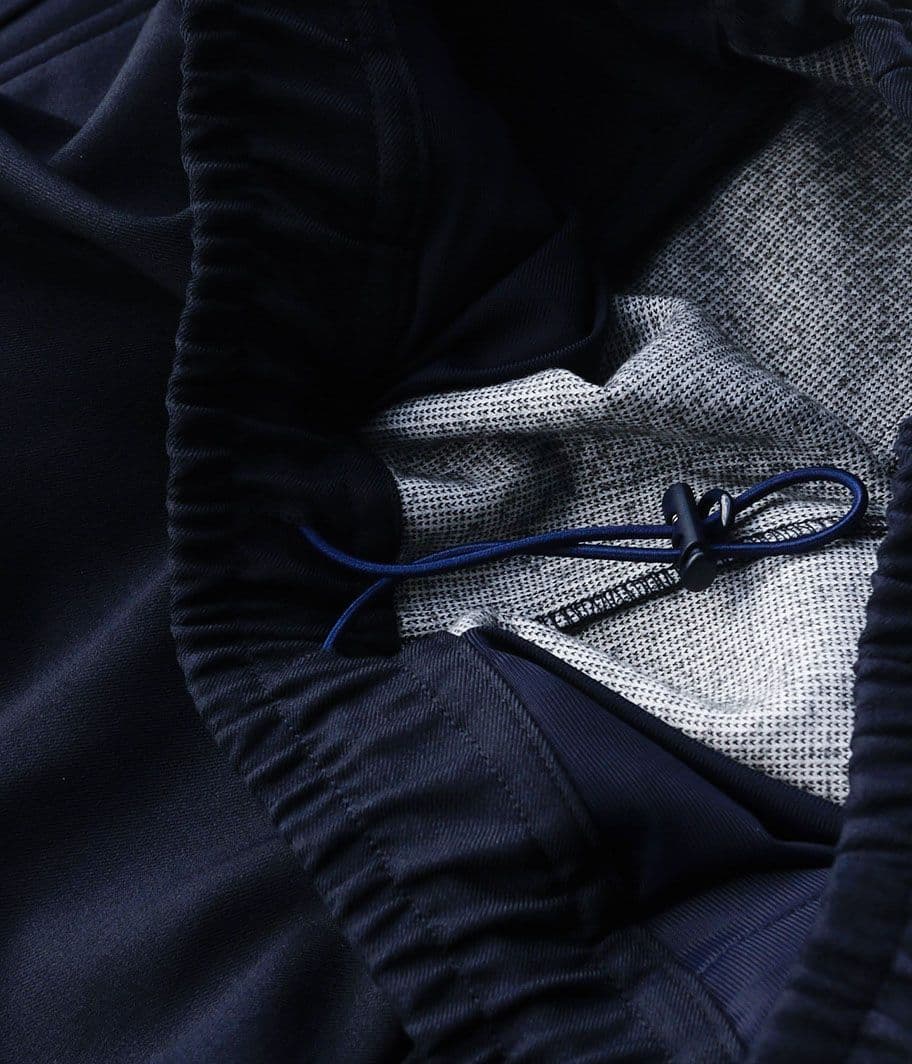 パンツ DOWN FABRIC TWO TUCK TRACK PANTS