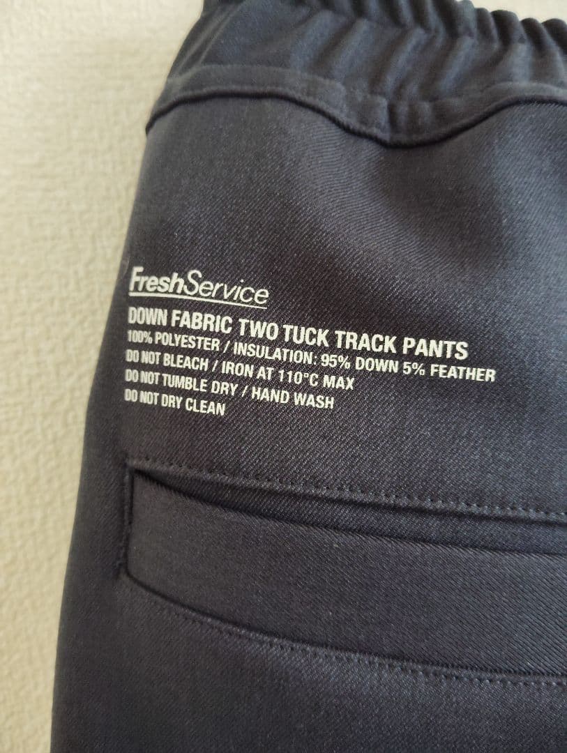 パンツ DOWN FABRIC TWO TUCK TRACK PANTS