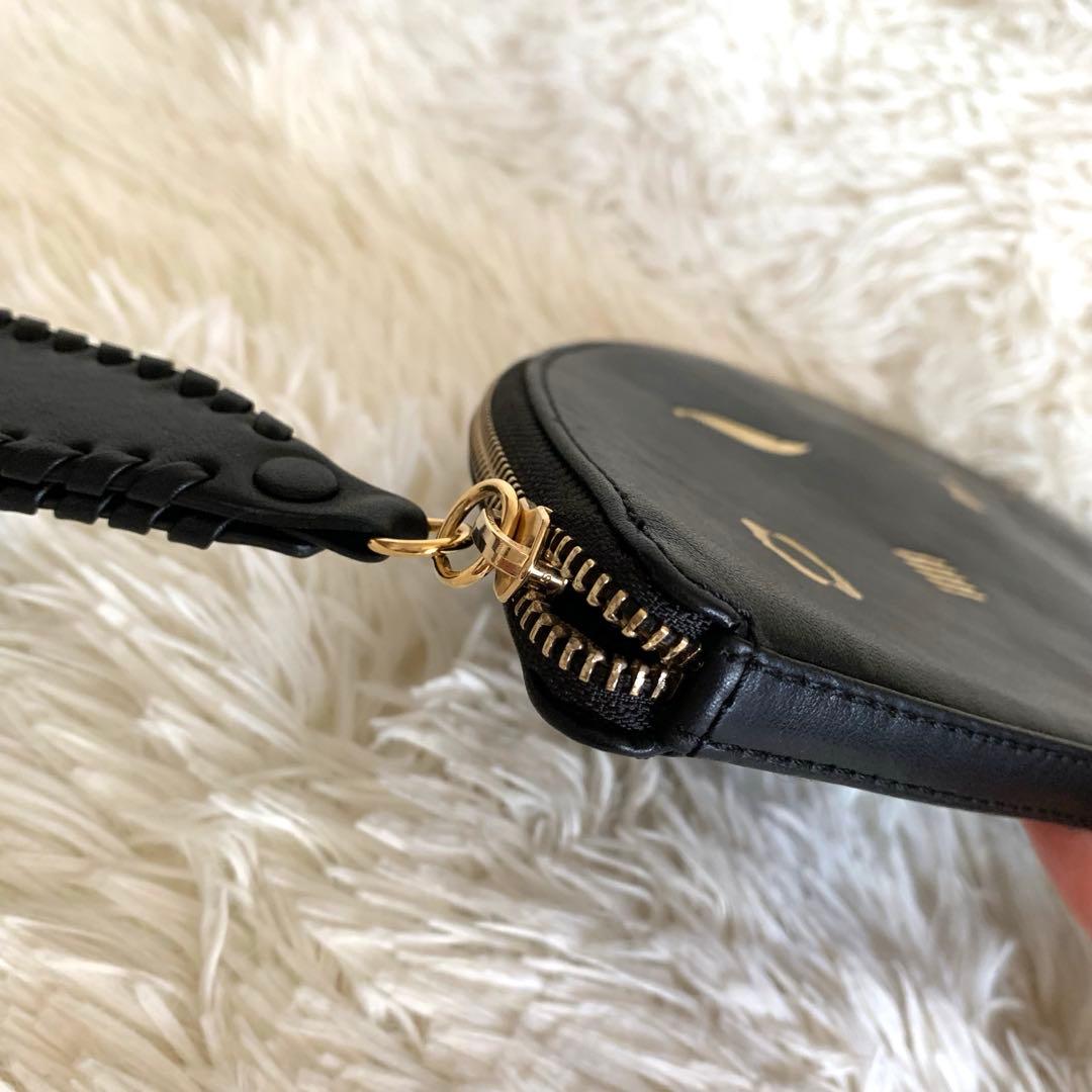 ペルテガス クラッチバッグ 半円 革　 ブラック