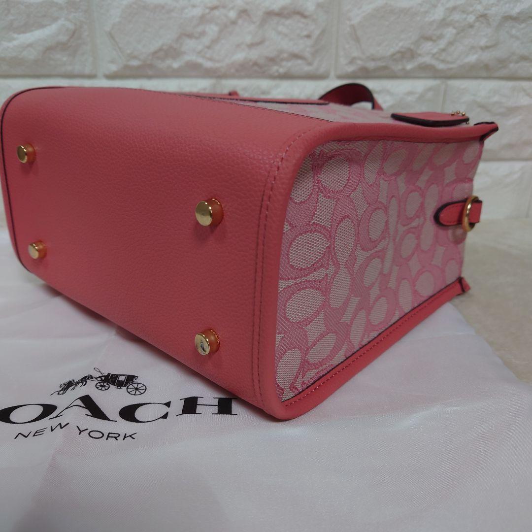 バッグ COACH Dempsey totebag Signature pink