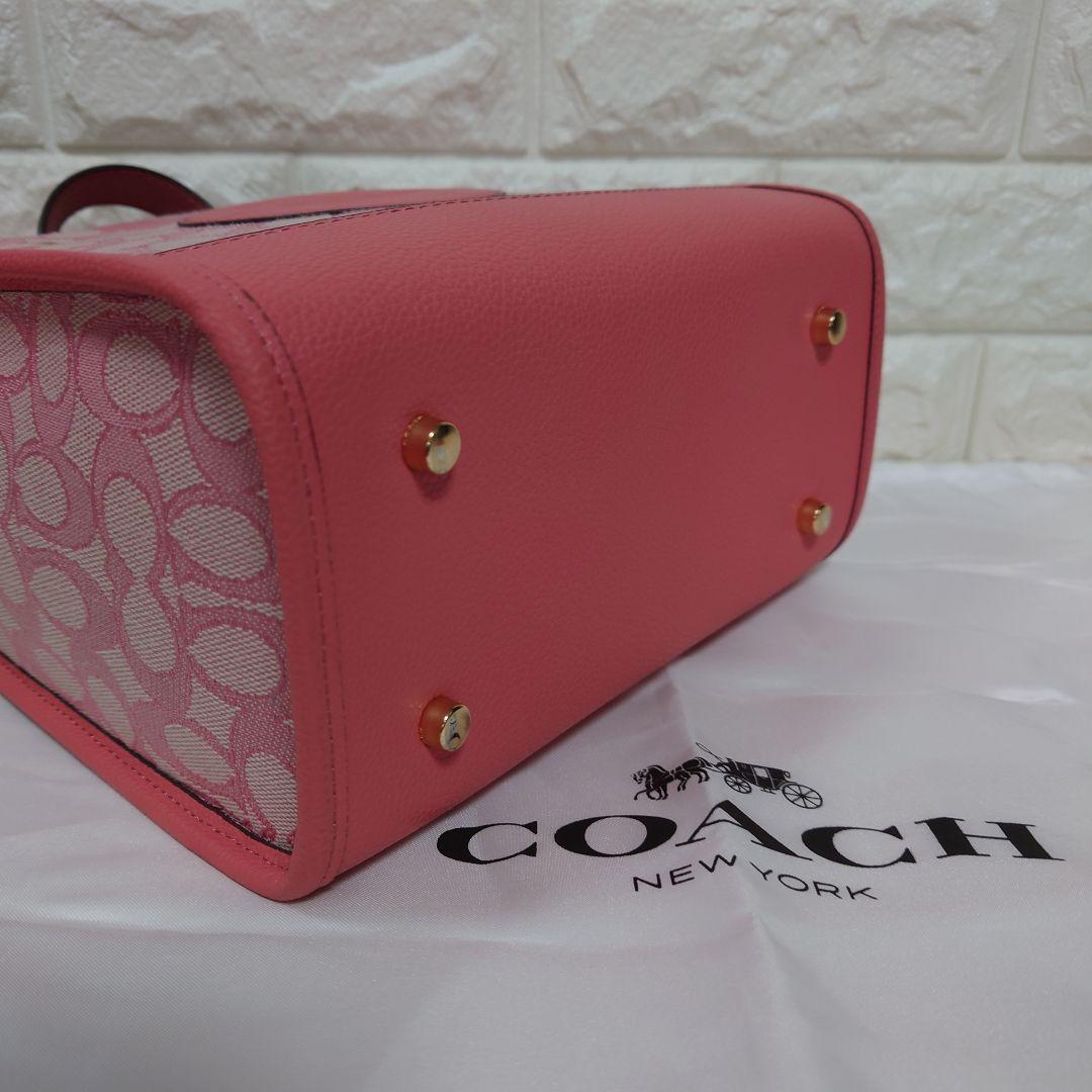 バッグ COACH Dempsey totebag Signature pink