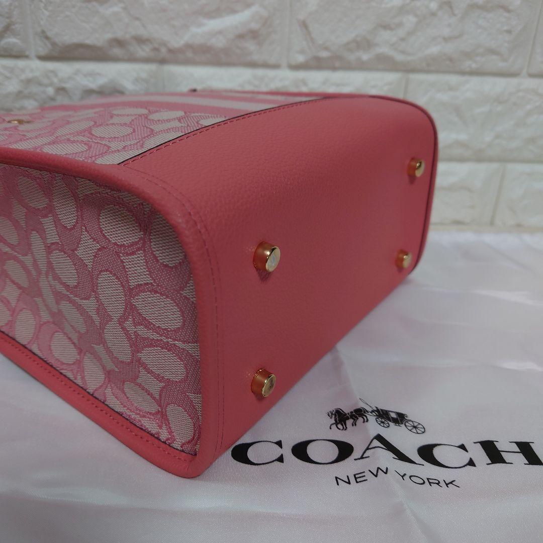 バッグ COACH Dempsey totebag Signature pink