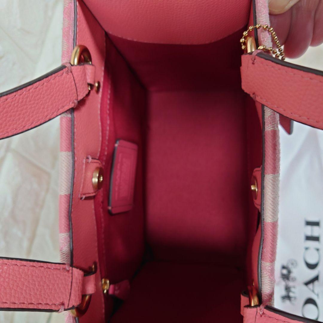 バッグ COACH Dempsey totebag Signature pink