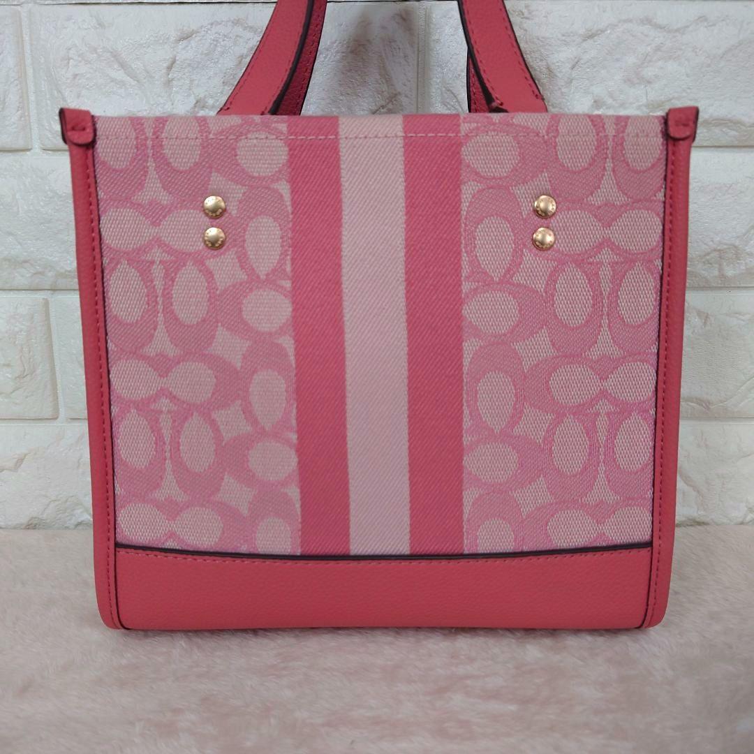 バッグ COACH Dempsey totebag Signature pink