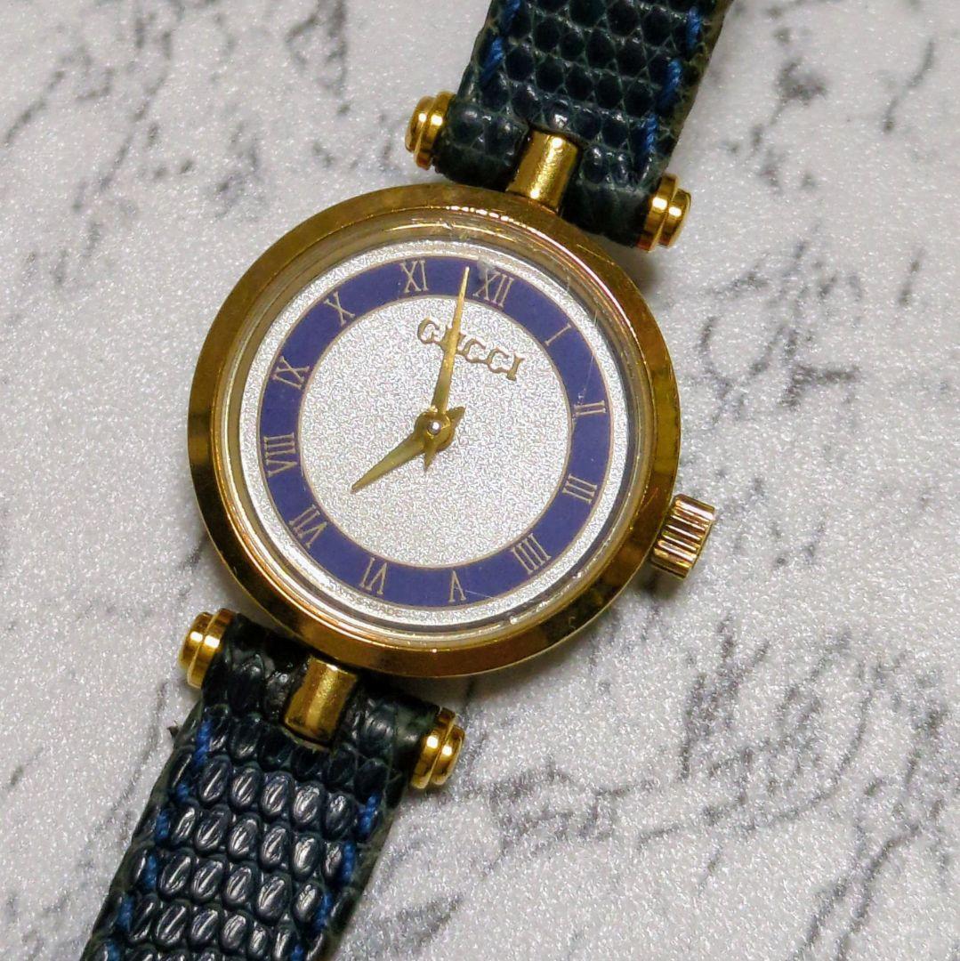可動　Gucci ゴールド ネイビー アナログシェリーライン腕時計