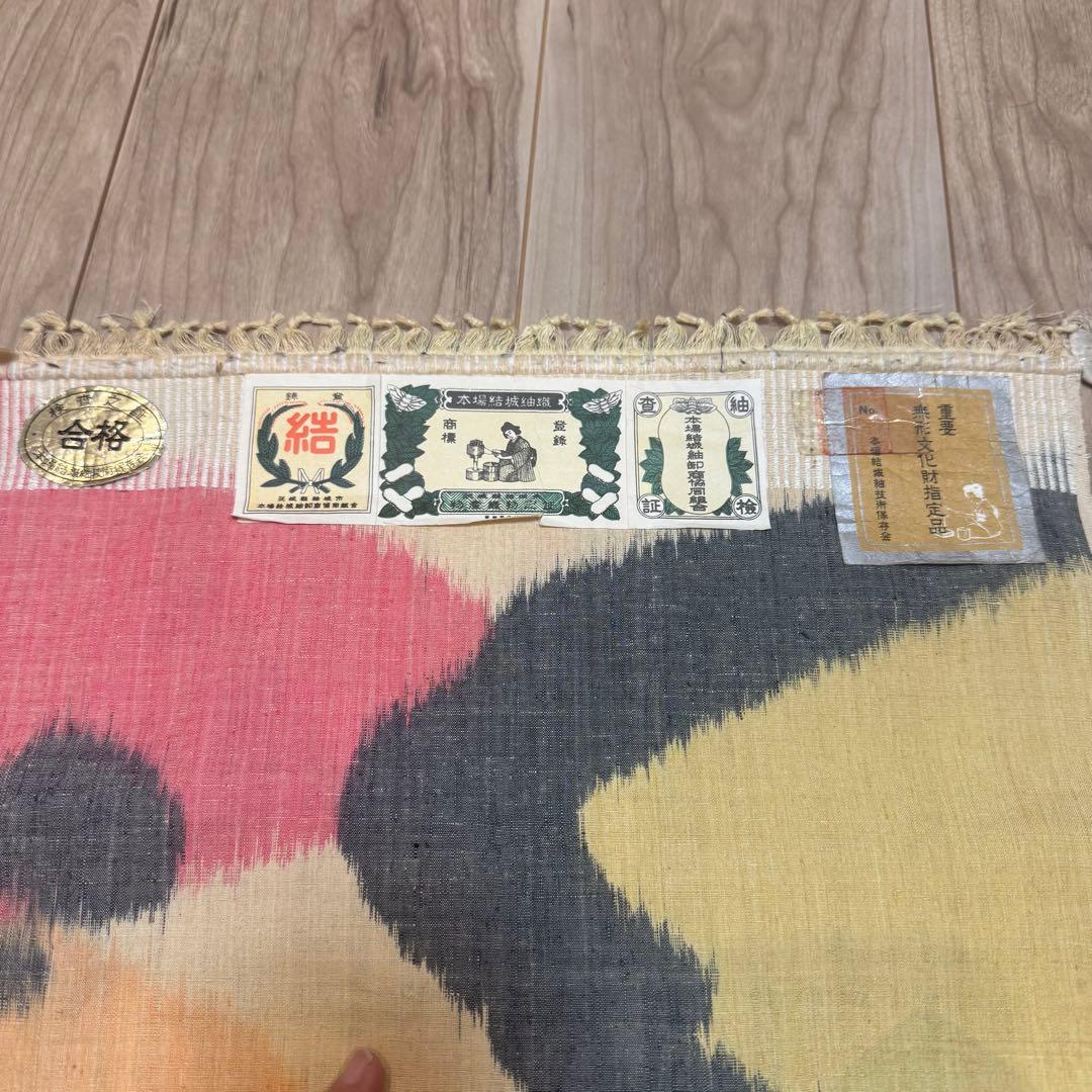 未使用　超美品　本場結城紬　無形重要文化財　結城紬　紬　反物　薄黄　紅色　黄緑