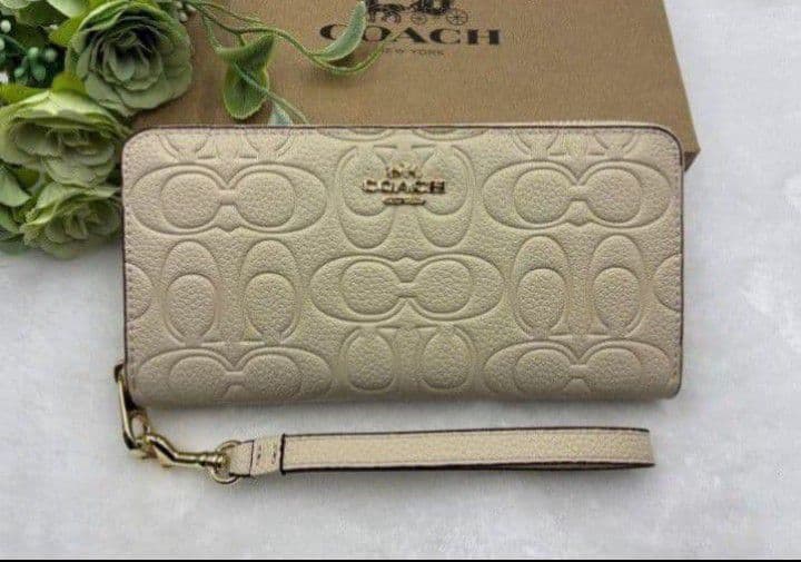 新品未使用コーチ長財布ロゴシグネチャーホワイトレディースメンズ送料無料即日発送