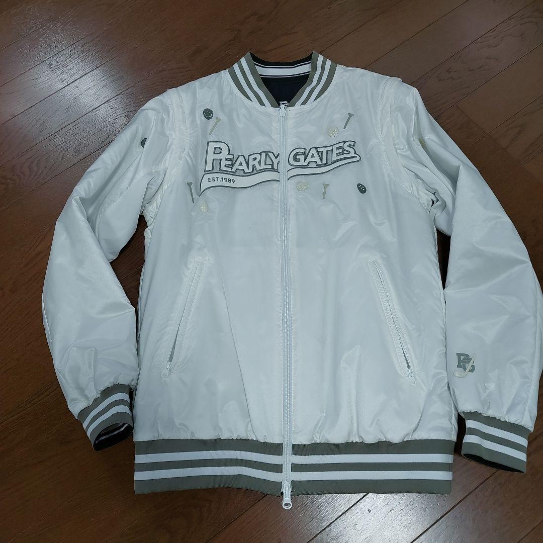 ま*ん様 PEARLY GATES 新品リバ－シブルです。ゴルフジャケット ホワ